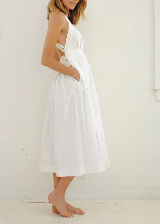 GR | Backless, pleated dress with large pockets