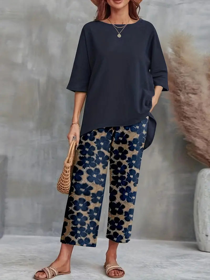 GR | Solid T-shirt with wide legs and round neckline with floral motif