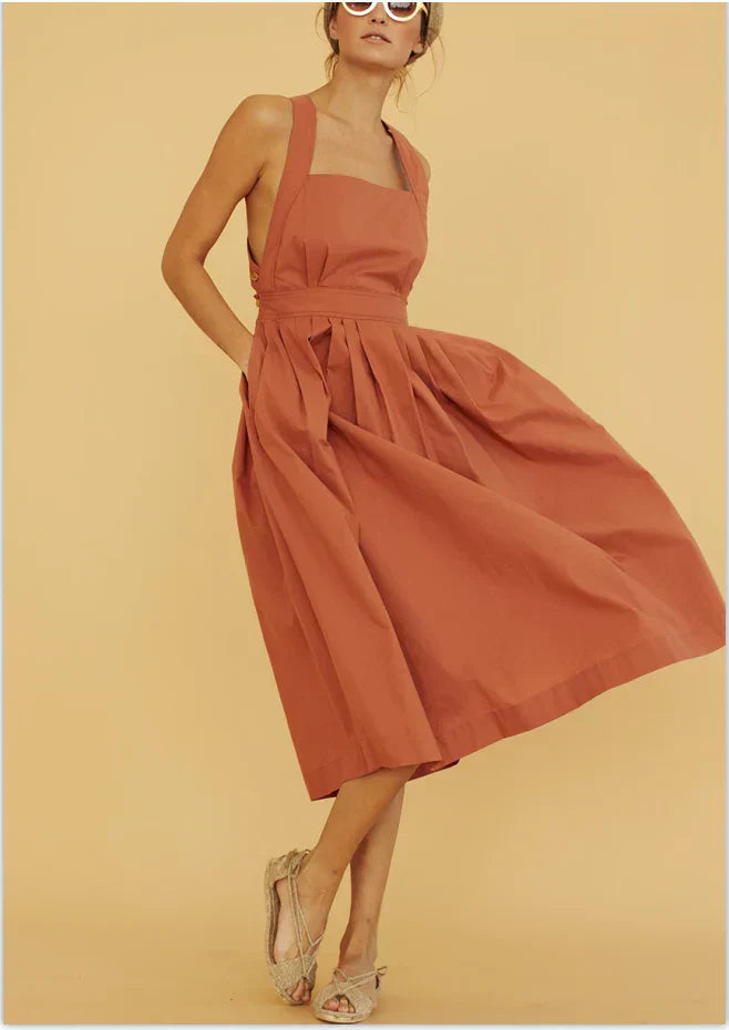 GR | Backless, pleated dress with large pockets