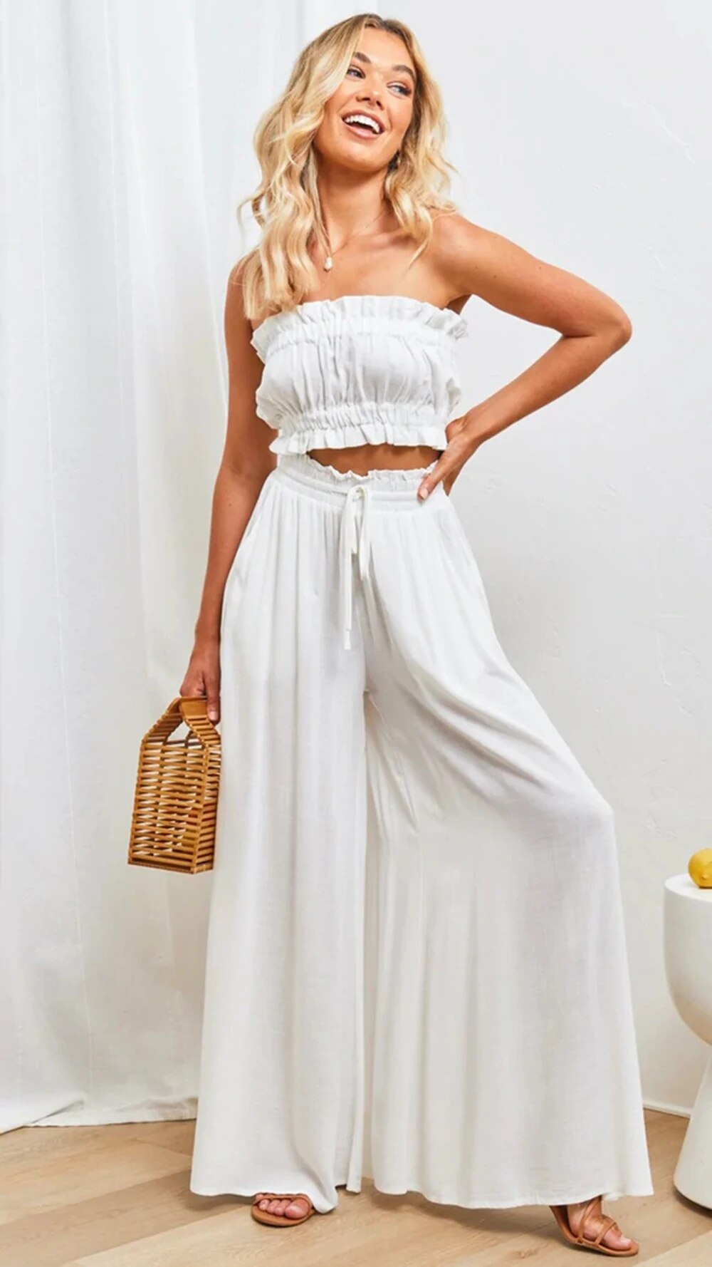 GR - Wide-legged trousers with elasticated waistband