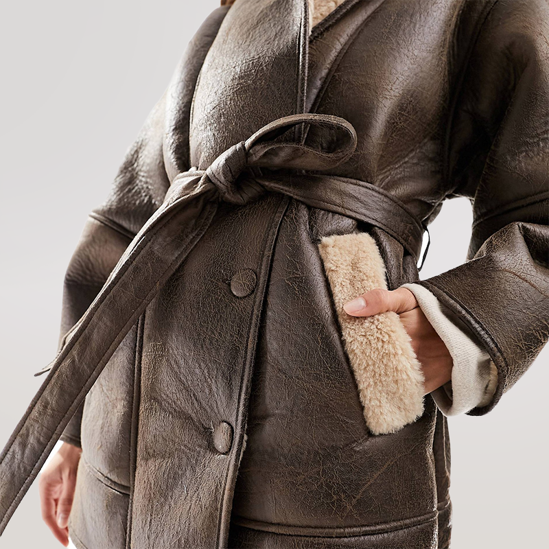 GR | Sherpa-lined faux leather jacket with belt