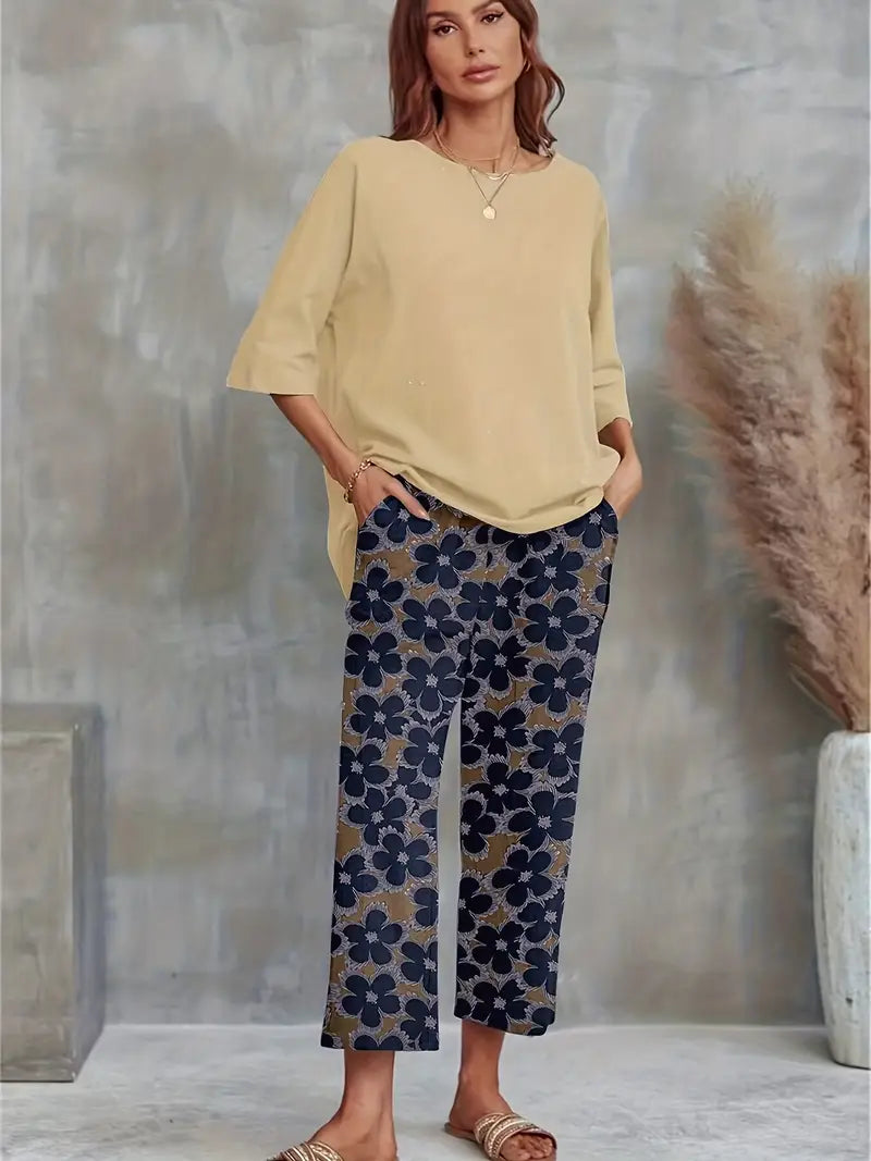 GR | Solid T-shirt with wide legs and round neckline with floral motif