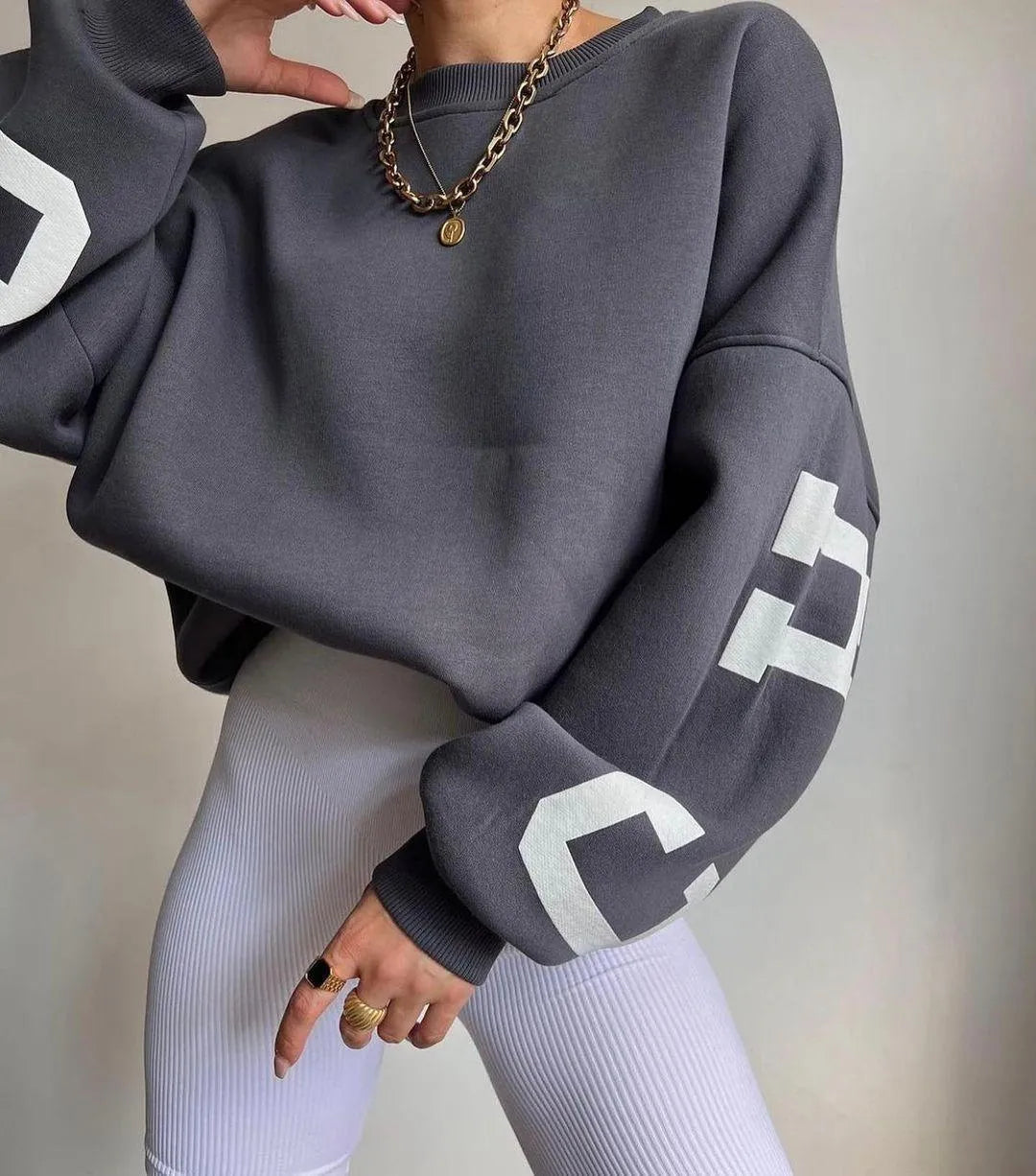 GR | Damenpullover mit lässigem Druck