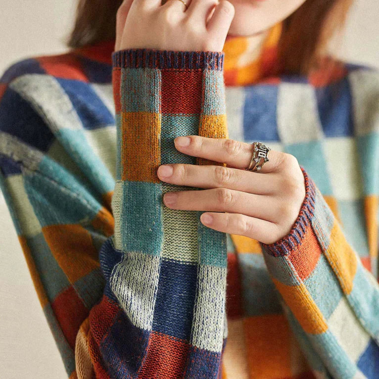 Sweater with a high collar in a checked pattern