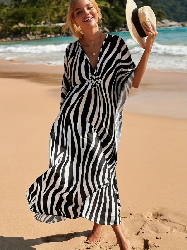 GR | Beach dress with zebra print and V-neck