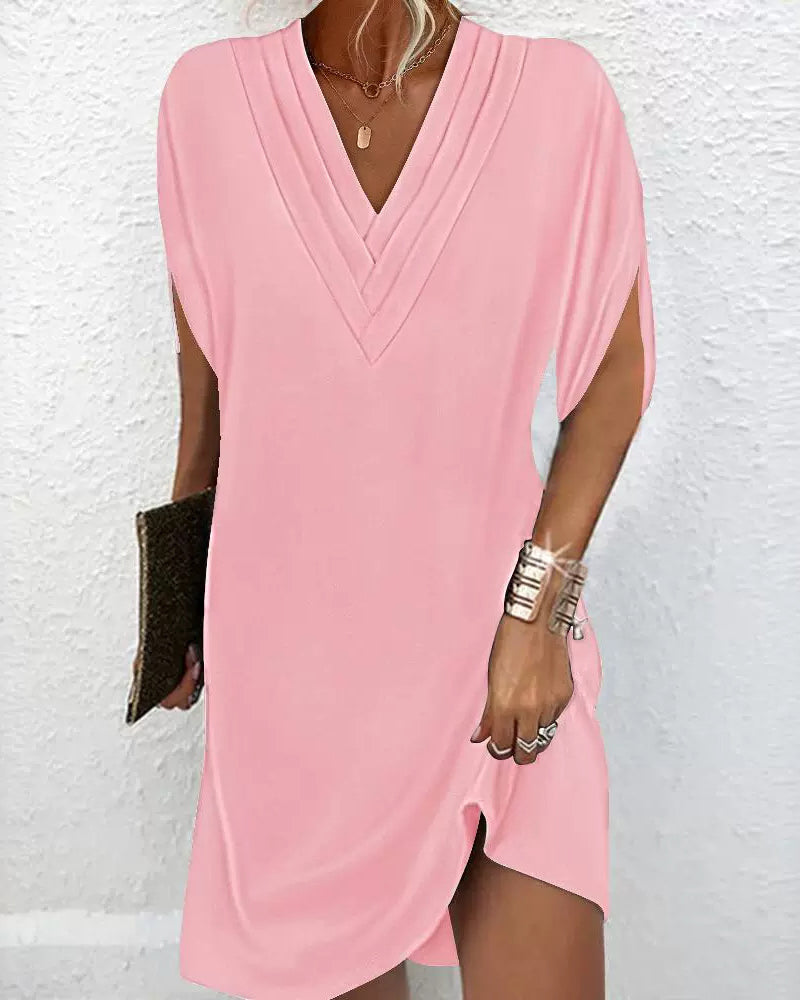 Elegant dress with slit sleeves