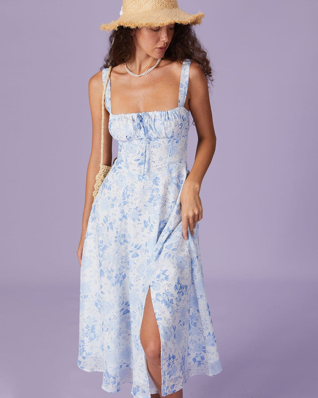 Blue midi dress with floral pattern and square neckline